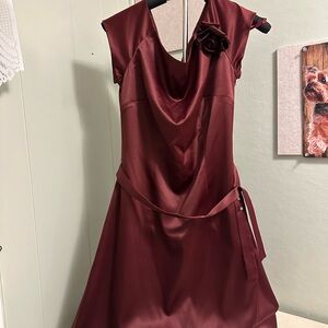 Elegant Burgundy Dress with Floral Accent